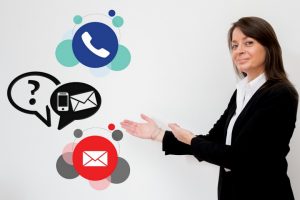 Kathleen Peddicord answering emails and phone calls